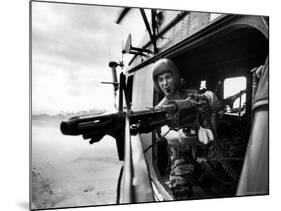 Helicopter Crew Chief James Farley Using M-60 Machine Gun in Landing Zone Near Da Nang-Larry Burrows-Mounted Photographic Print