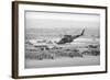 Helicopter Flying over Land Site-null-Framed Photographic Print