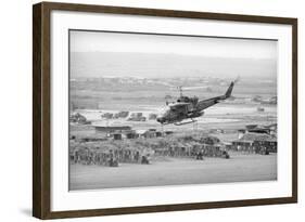 Helicopter Flying over Land Site-null-Framed Photographic Print