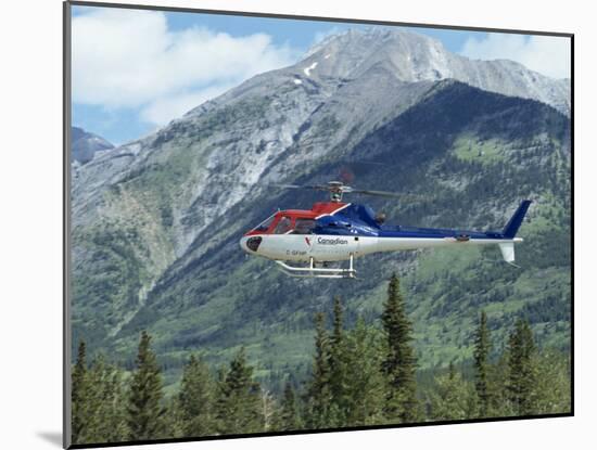 Helicopter in the Rocky Mountains, British Columbia, Canada, North America-Robert Harding-Mounted Photographic Print