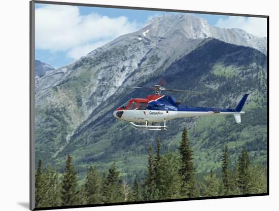 Helicopter in the Rocky Mountains, British Columbia, Canada, North America-Robert Harding-Mounted Photographic Print