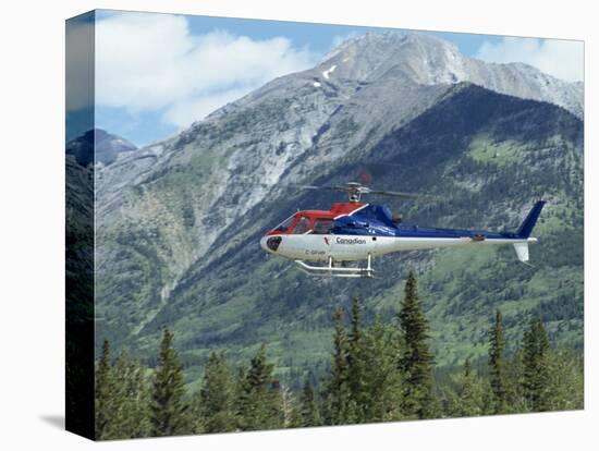 Helicopter in the Rocky Mountains, British Columbia, Canada, North America-Robert Harding-Stretched Canvas