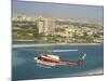 Helicopter over Abu Dhabi, U.A.E., Middle East-Ryan Peter-Mounted Photographic Print