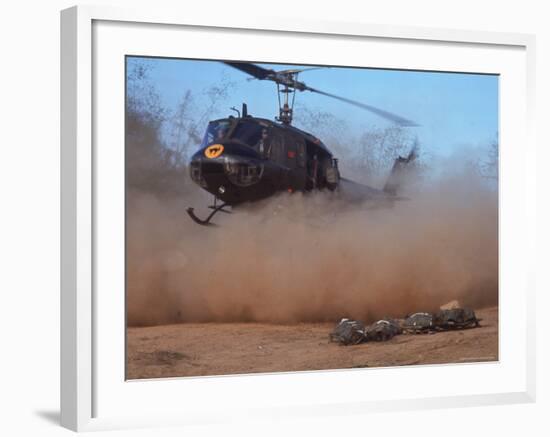 Helicopter Touching Down to Retrieve Bodies of Soldiers Killed in Firefight During the Vietnam War-Larry Burrows-Framed Photographic Print