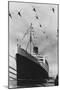 Helicopters Fly over the Queen Mary-null-Mounted Photographic Print