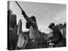 Herbert Lee Pratt Firing His Gun Toward a Grouse While the Loader Reloads Ammunition-John Phillips-Stretched Canvas