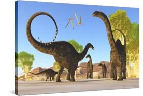 Herd of Apatosaurus Dinosaurs Wander Through a Prehistoric Forest-null-Stretched Canvas