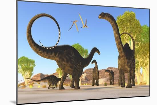 Herd of Apatosaurus Dinosaurs Wander Through a Prehistoric Forest-null-Mounted Art Print