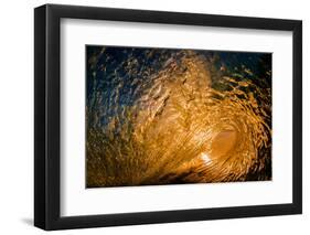 Here comes the sun-Looking out of a tubing wave at sunrise from inside the wave-Mark A Johnson-Framed Photographic Print