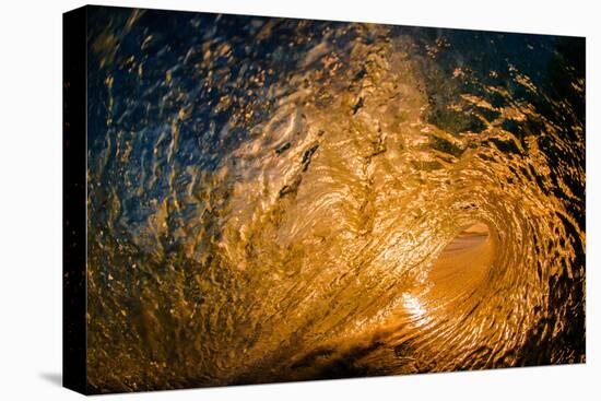 Here comes the sun-Looking out of a tubing wave at sunrise from inside the wave-Mark A Johnson-Stretched Canvas