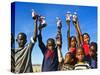 Herero Children Selling Herero Dolls, Damaraland, Kunene Region, Namibia, Africa-Nico Tondini-Stretched Canvas