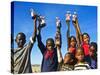 Herero Children Selling Herero Dolls, Damaraland, Kunene Region, Namibia, Africa-Nico Tondini-Stretched Canvas