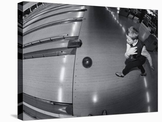 High Angle View of a Boy Bowling-null-Stretched Canvas