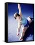 High Angle View of a Female Gymnast Stretching-null-Framed Stretched Canvas