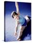 High Angle View of a Female Gymnast Stretching-null-Stretched Canvas