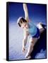 High Angle View of a Female Gymnast Stretching-null-Framed Stretched Canvas