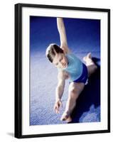 High Angle View of a Female Gymnast Stretching-null-Framed Photographic Print