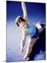 High Angle View of a Female Gymnast Stretching-null-Mounted Photographic Print