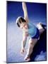 High Angle View of a Female Gymnast Stretching-null-Mounted Photographic Print