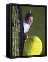 High Angle View of a Man Hitting a Tennis Ball-null-Framed Stretched Canvas