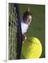 High Angle View of a Man Hitting a Tennis Ball-null-Framed Photographic Print