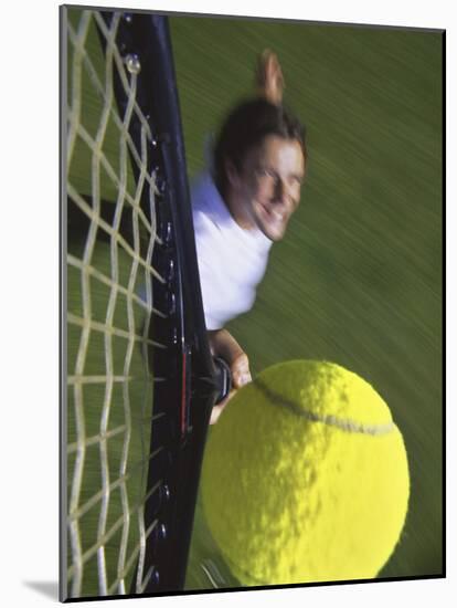 High Angle View of a Man Hitting a Tennis Ball-null-Mounted Photographic Print