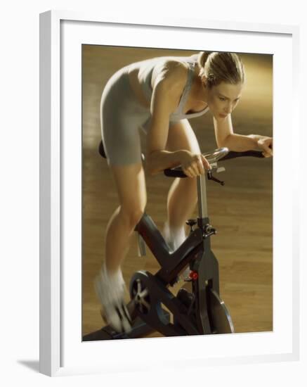 High Angle View of a Mid Adult Woman Exercising in a Gym-null-Framed Photographic Print