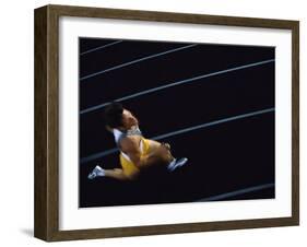 High Angle View of a Young Man Running on a Running Track-null-Framed Photographic Print