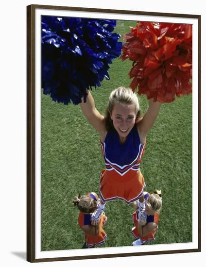 High Angle View of Cheerleaders Performing with Pom-Poms-null-Framed Photographic Print