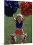 High Angle View of Cheerleaders Performing with Pom-Poms-null-Mounted Photographic Print