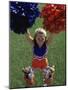 High Angle View of Cheerleaders Performing with Pom-Poms-null-Mounted Photographic Print