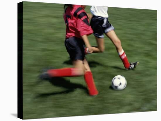 High Angle View of Two People Playing Soccer-null-Stretched Canvas
