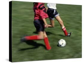 High Angle View of Two People Playing Soccer-null-Stretched Canvas