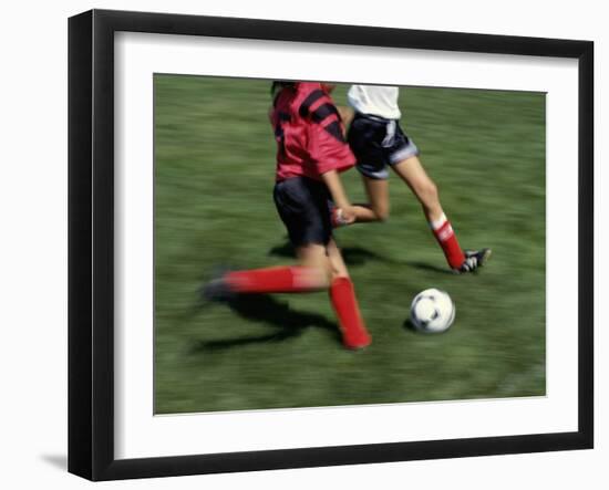 High Angle View of Two People Playing Soccer-null-Framed Premium Photographic Print