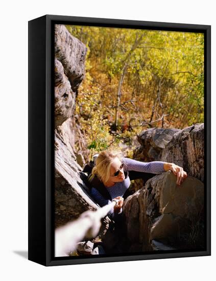 High Angle View of Young Woman Rock Climbing-null-Framed Stretched Canvas