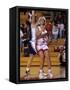 High School Girls Basketball Players in Action During a Game-null-Framed Stretched Canvas