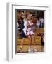High School Girls Basketball Players in Action During a Game-null-Framed Premium Photographic Print