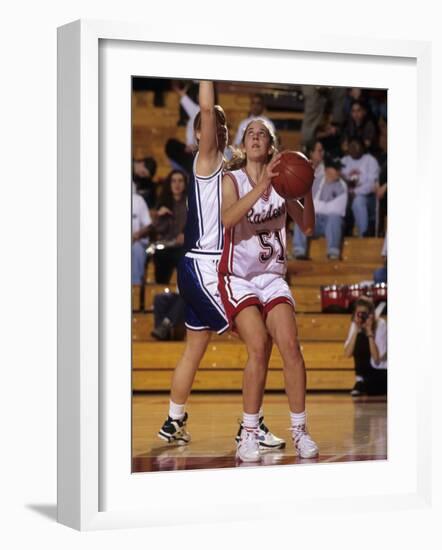 High School Girls Basketball Players in Action During a Game-null-Framed Photographic Print