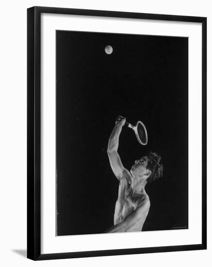 High Speed Photograph of Tennis Pro Bobby Riggs Serving a Ball-Gjon Mili-Framed Premium Photographic Print