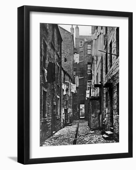 High Street Slum Buildings in Glasgow-null-Framed Photographic Print