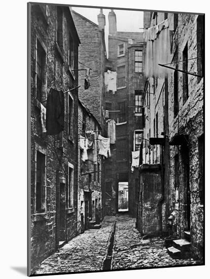 High Street Slum Buildings in Glasgow-null-Mounted Photographic Print