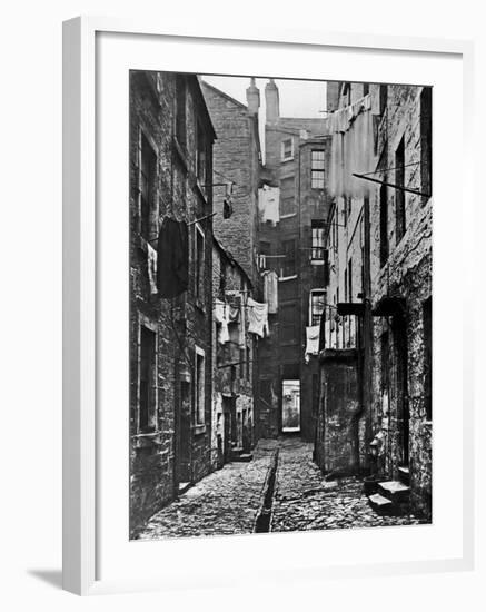 High Street Slum Buildings in Glasgow-null-Framed Photographic Print