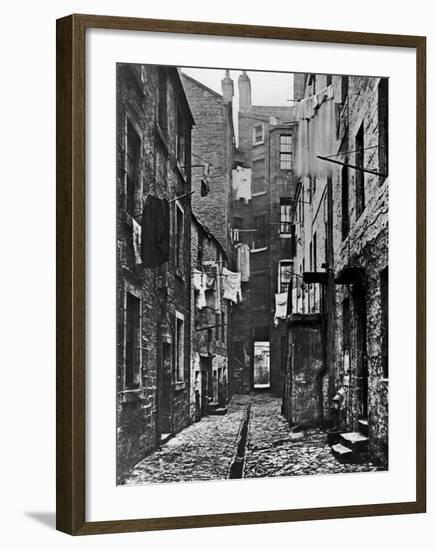 High Street Slum Buildings in Glasgow-null-Framed Photographic Print