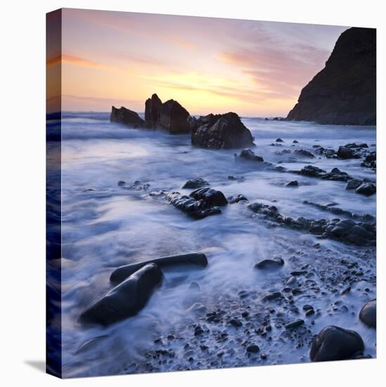 High Tide on Duckpool Beach at Sunset, North Cornwall, England. Spring-Adam Burton-Stretched Canvas