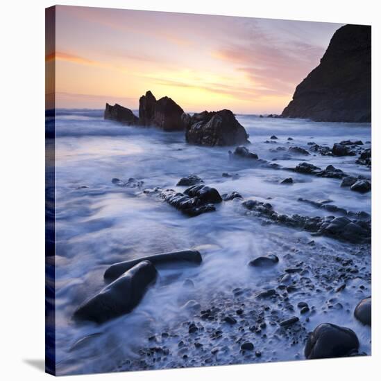 High Tide on Duckpool Beach at Sunset, North Cornwall, England. Spring-Adam Burton-Stretched Canvas