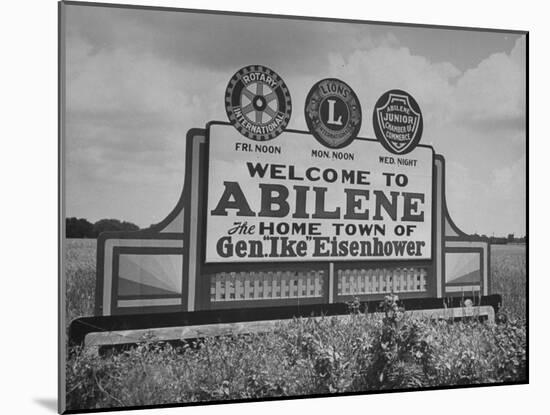 Highway Sign Welcoming Tourists to the Home Town of General Dwight D. Eisenhower-Myron Davis-Mounted Photographic Print
