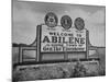 Highway Sign Welcoming Tourists to the Home Town of General Dwight D. Eisenhower-Myron Davis-Mounted Photographic Print