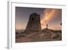 Hiker Admires Sunset from the Stone Tower Overlooking the Bay, Porto Giunco, Villasimius-Roberto Moiola-Framed Photographic Print