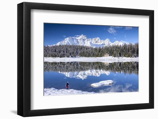 Hiker Admires the Snowy Peaks and Woods Reflected in Lake Palu, Malenco Valley, Valtellina, Italy-Roberto Moiola-Framed Photographic Print