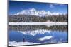 Hiker Admires the Snowy Peaks and Woods Reflected in Lake Palu, Malenco Valley, Valtellina, Italy-Roberto Moiola-Mounted Photographic Print